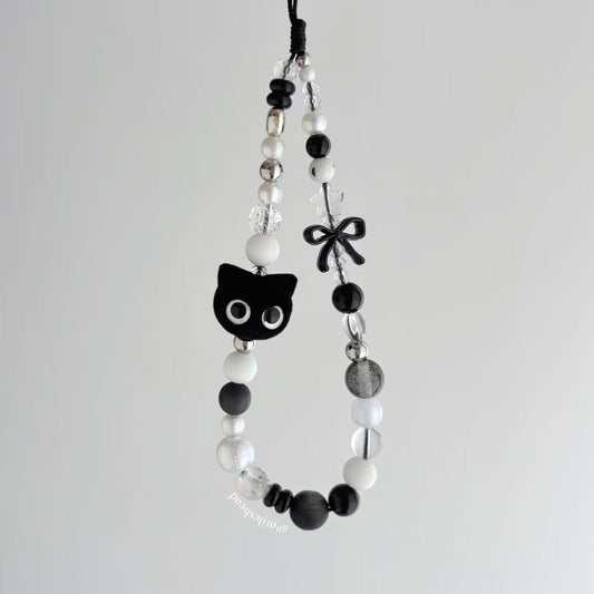 Black cat phone charm