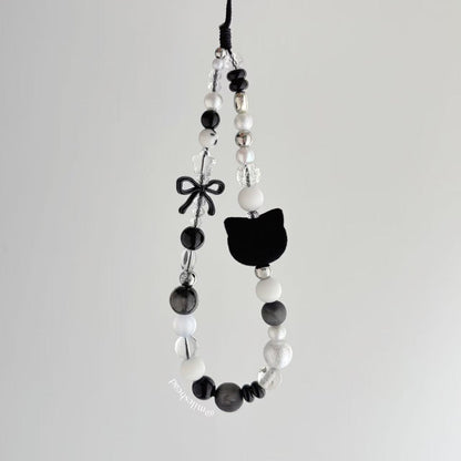 Black cat phone charm